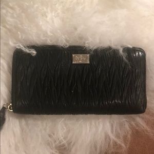 Women’s black leather Coach wallet